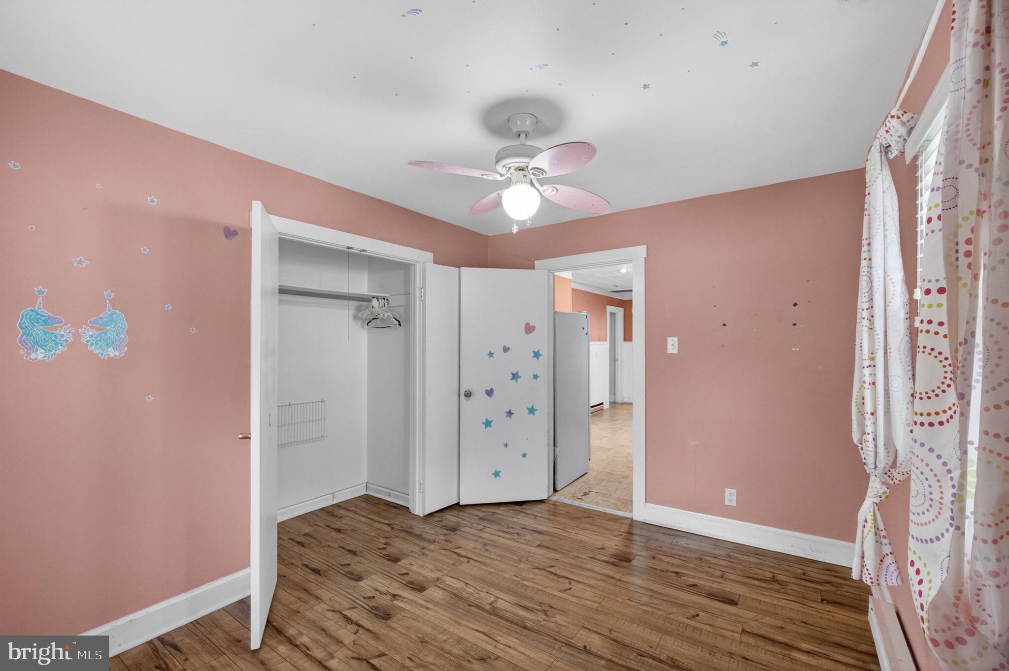 6800 Partlow Road Spotsylvania, VA 22551 - Photo 24 of 27 Charming pastel room with cozy vibes.