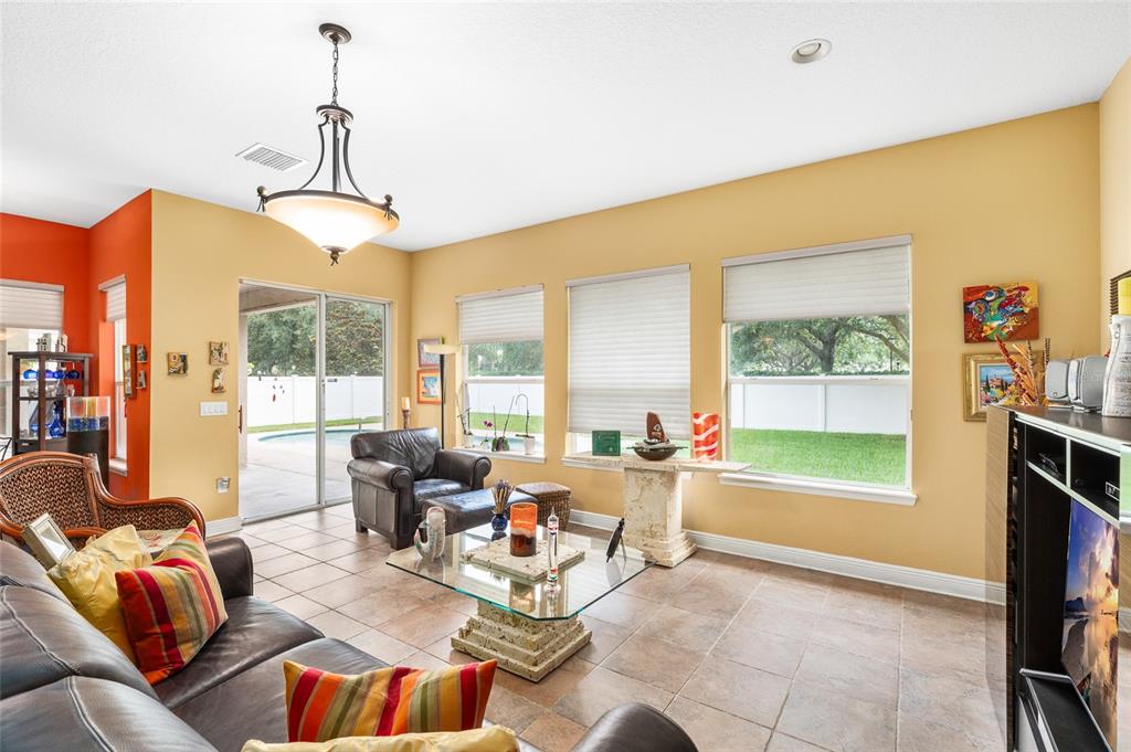11845 Newberry Grove Loop Riverview, FL 33579 - Photo 21 of 47 a living room with furniture and a window