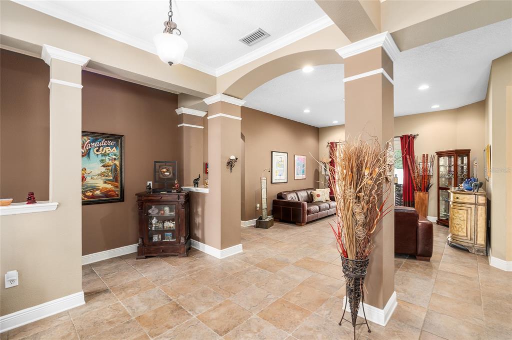 11845 Newberry Grove Loop Riverview, FL 33579 - Photo 3 of 47 a view of a livingroom with closet and a living room
