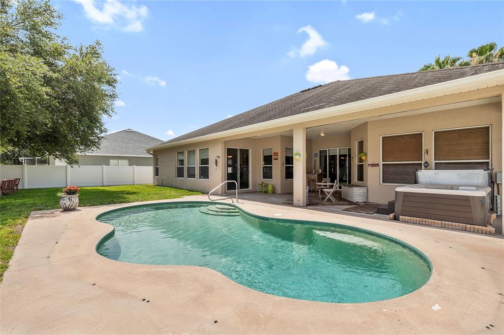 11845 Newberry Grove Loop Riverview, FL 33579 - Photo 33 of 47 a view of a house with swimming pool and porch