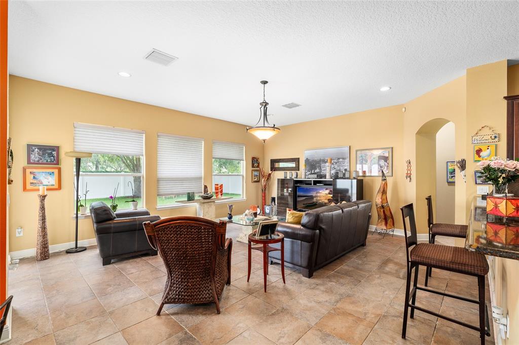 11845 Newberry Grove Loop Riverview, FL 33579 - Photo 7 of 47 a view of a dining room with furniture window and outside view