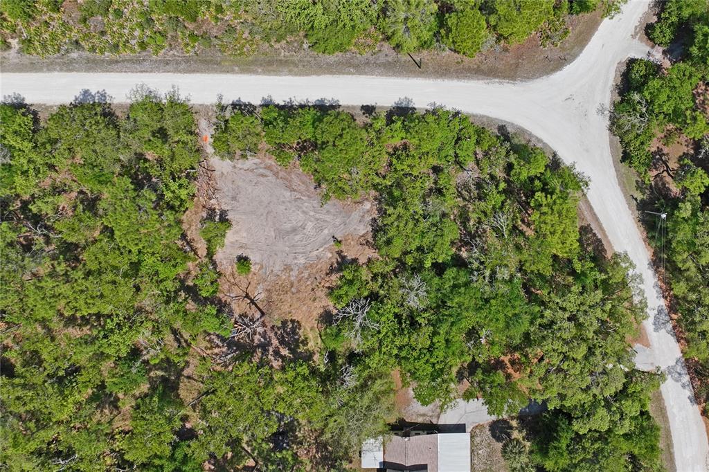 0 Yellowstone Avenue Weeki Wachee, FL 34614 - Photo 12 of 18 an aerial view of a house with a yard