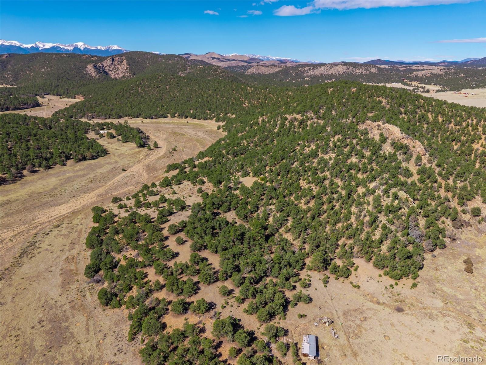 710 McClure Gulch Road Cotopaxi, CO 81223 - Photo 3 of 8 a view of a mountain with an outdoor space