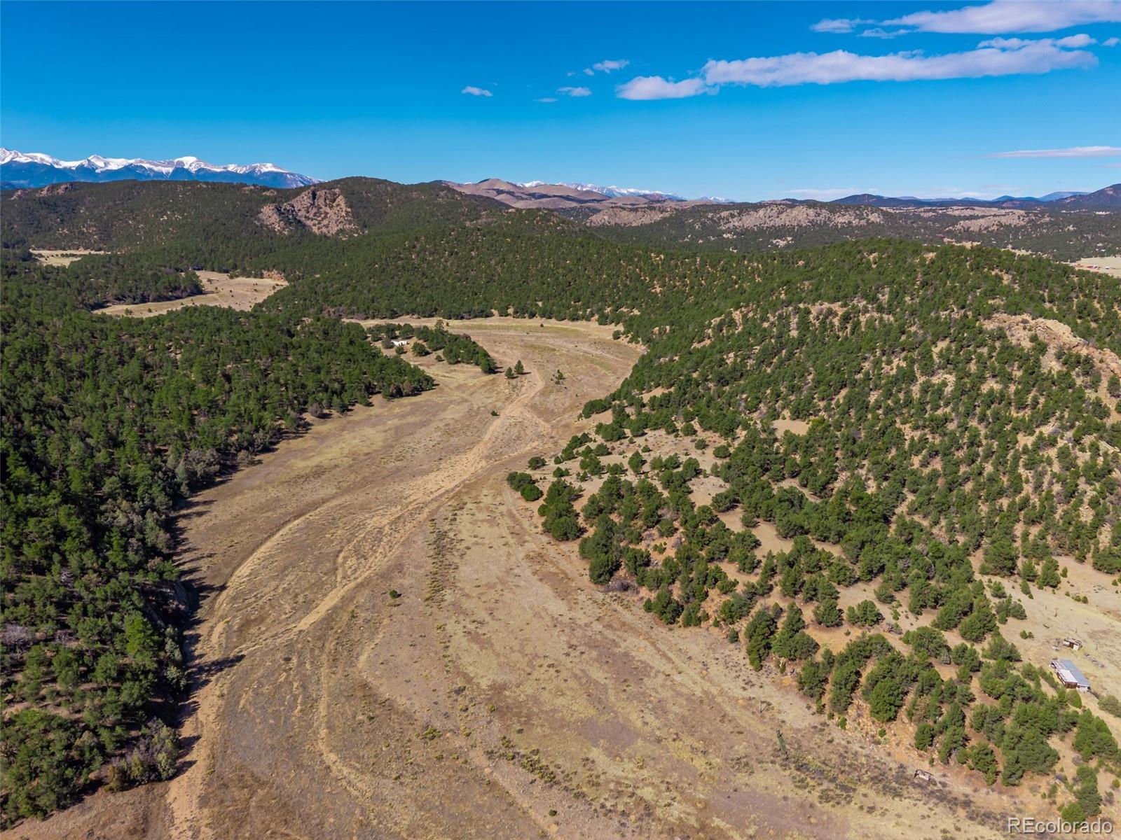 710 McClure Gulch Road Cotopaxi, CO 81223 - Photo 4 of 8 a view of a city with mountains in the background