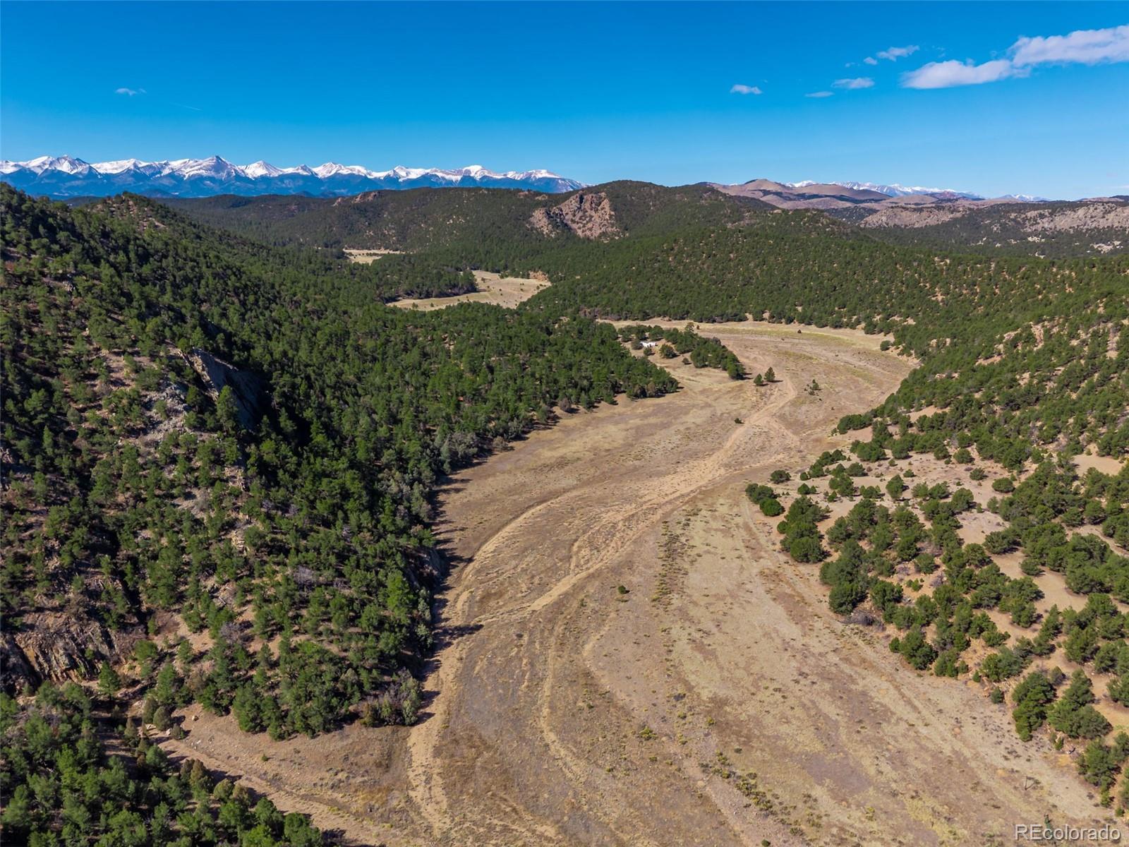 710 McClure Gulch Road Cotopaxi, CO 81223 - Photo 5 of 8 a view of a lake with a mountain