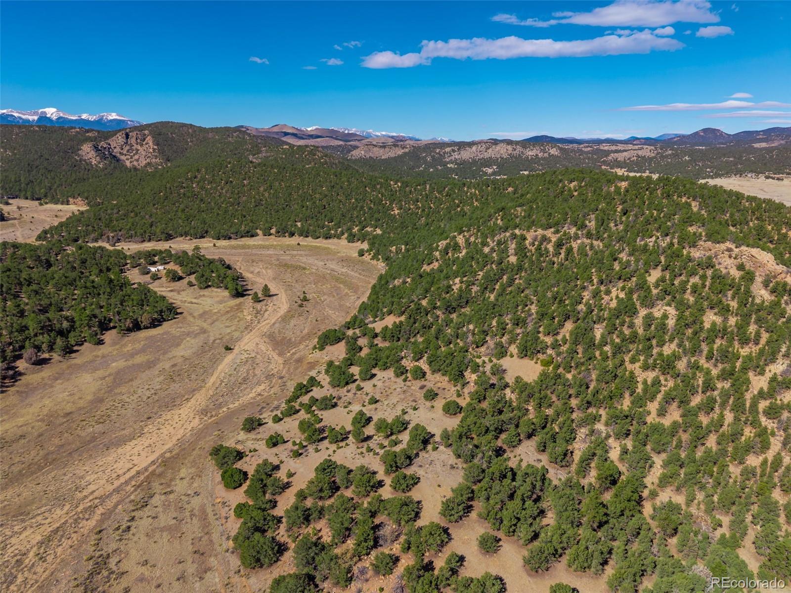 710 McClure Gulch Road Cotopaxi, CO 81223 - Photo 7 of 8 a view of a city with mountains in the background