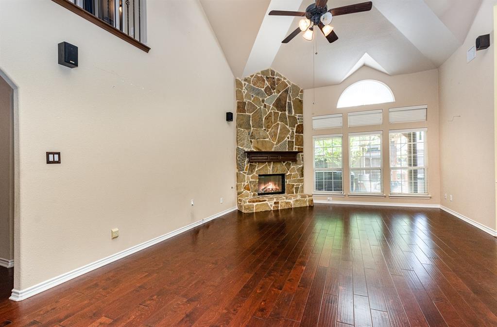 1325 Bateman Lane Celina, TX 75009 - Photo 2 of 39 wooden floor in an empty room with a window