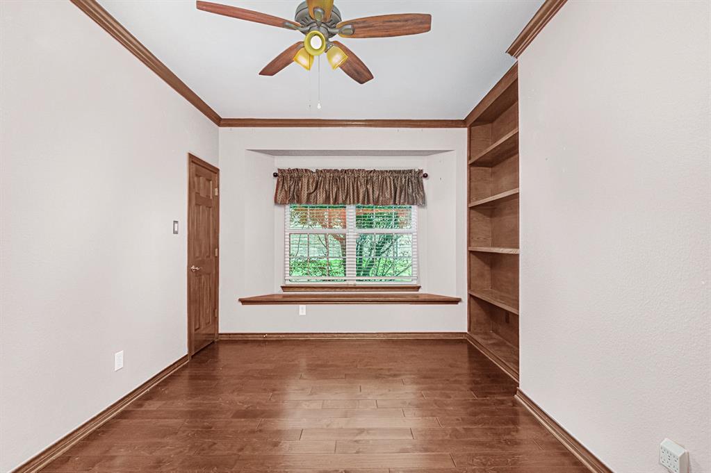 1325 Bateman Lane Celina, TX 75009 - Photo 21 of 39 a view of empty room with a window and a ceiling fan