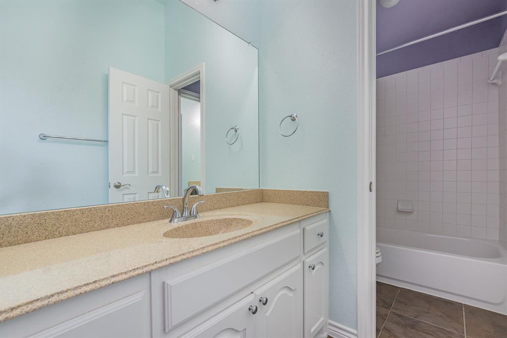 1325 Bateman Lane Celina, TX 75009 - Photo 28 of 39 a bathroom with a sink and a bathtub