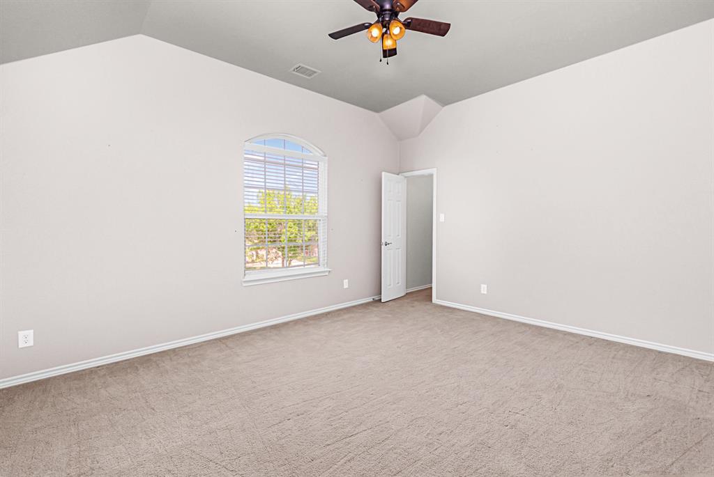 1325 Bateman Lane Celina, TX 75009 - Photo 29 of 39 an empty room with a window and ceiling fan