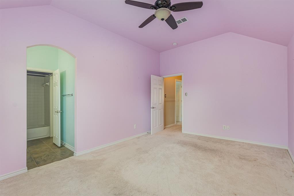 1325 Bateman Lane Celina, TX 75009 - Photo 33 of 39 a view of an empty room with a chandelier fan