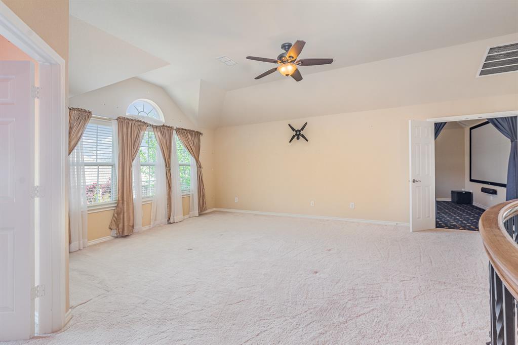 1325 Bateman Lane Celina, TX 75009 - Photo 34 of 39 a view of a livingroom with a staircase