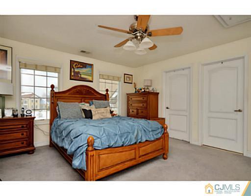 4 Rustic Court Monroe Township, NJ 08831 - Photo 19 of 25 a bedroom with a bed and window