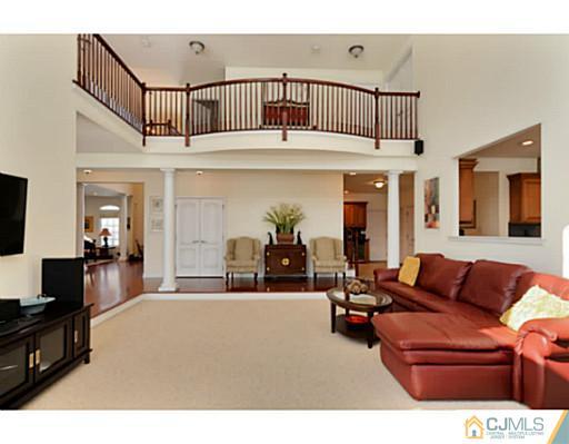 4 Rustic Court Monroe Township, NJ 08831 - Photo 5 of 25 a living room with furniture