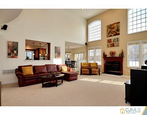 4 Rustic Court Monroe Township, NJ 08831 - Photo 6 of 25 a living room with furniture and a large window