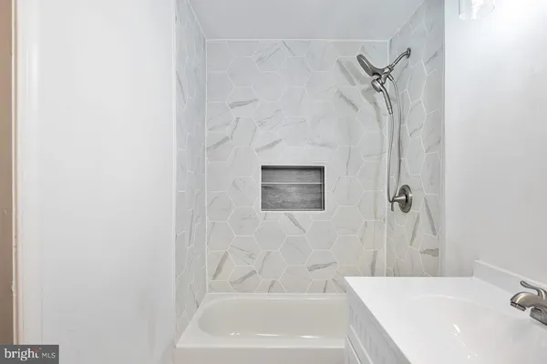 a bathroom with a bathtub