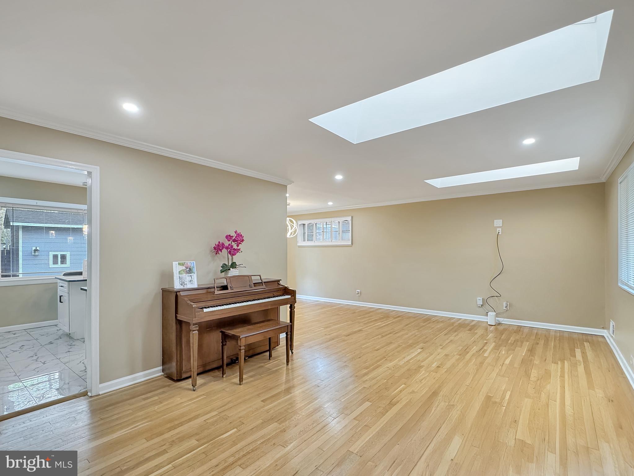 2408 Lillian Drive Silver Spring, MD 20902 - Photo 2 of 54 a living room with a wooden floor