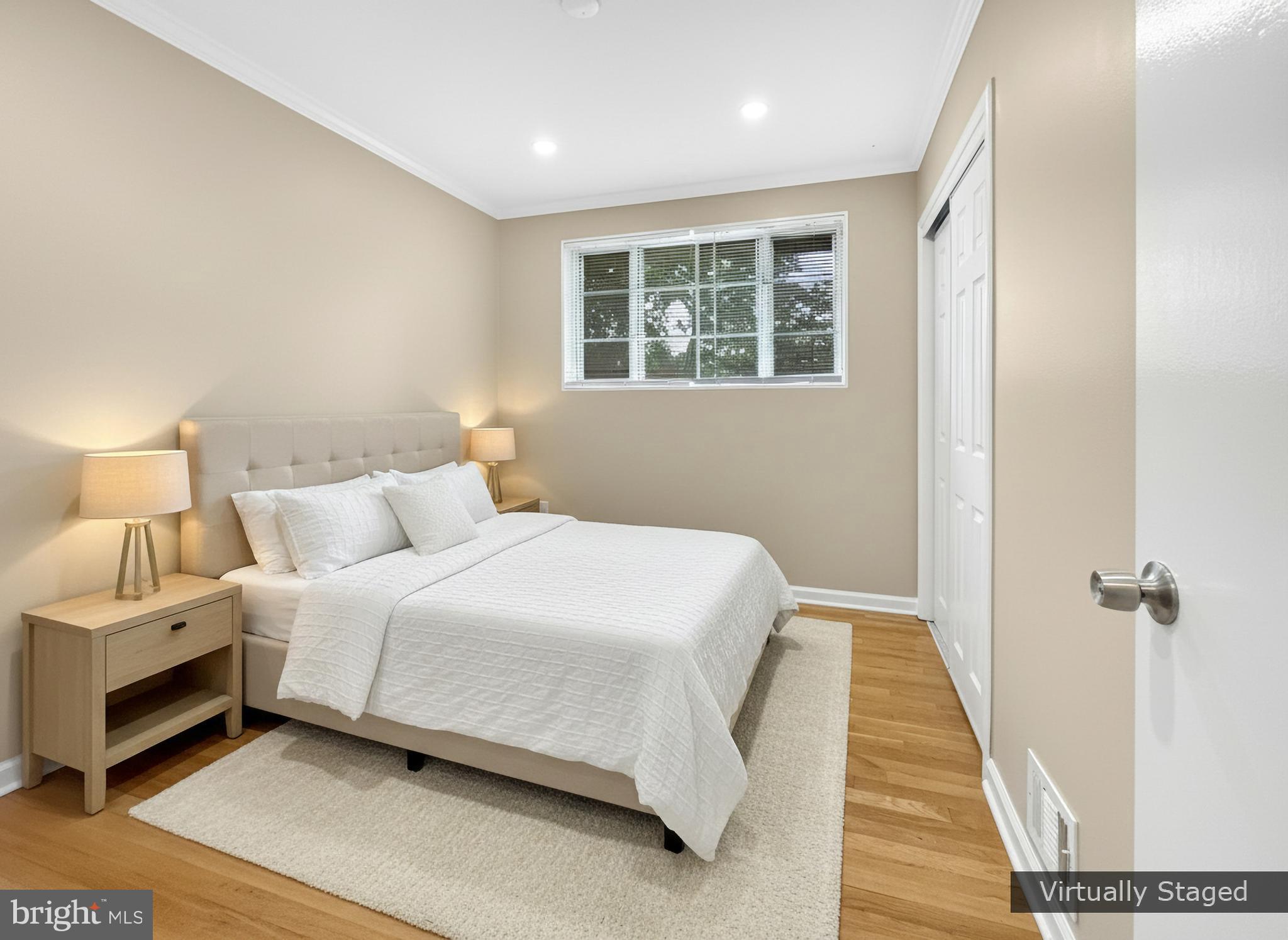 2408 Lillian Drive Silver Spring, MD 20902 - Photo 24 of 54 a bedroom with a bed and a window