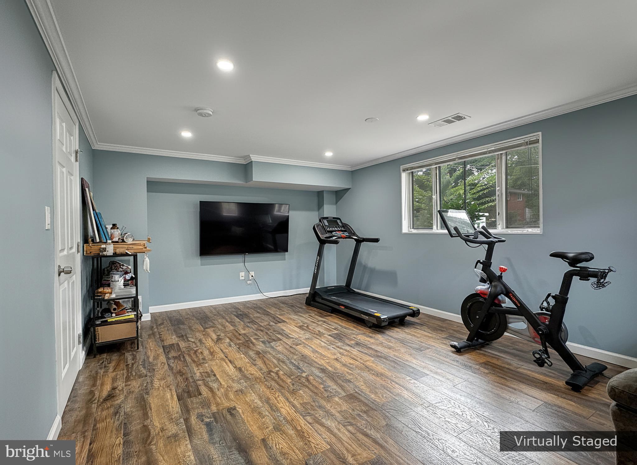 2408 Lillian Drive Silver Spring, MD 20902 - Photo 34 of 54 a view of a room with gym equipment