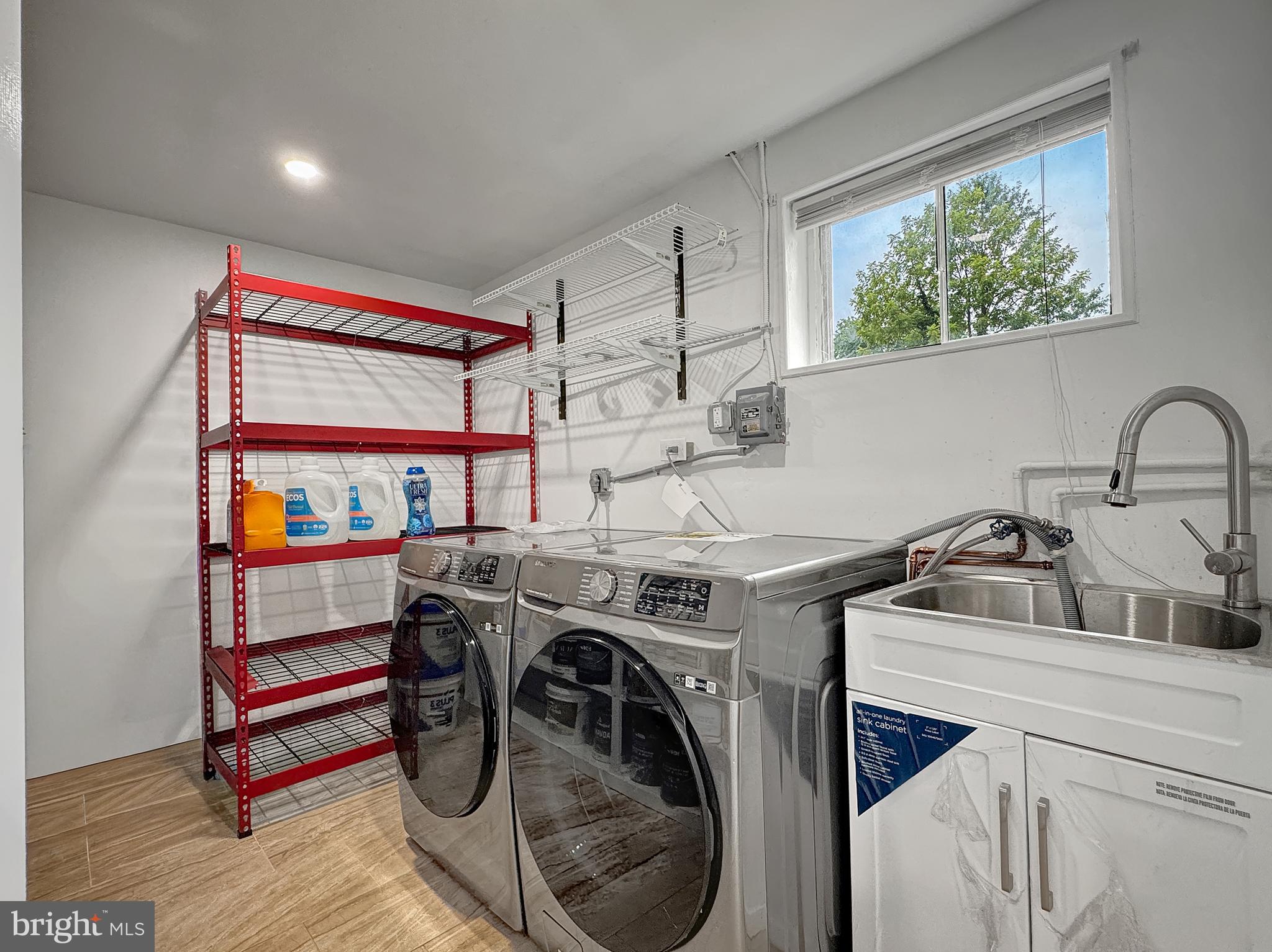 2408 Lillian Drive Silver Spring, MD 20902 - Photo 38 of 54 a utility room with dryer and washer