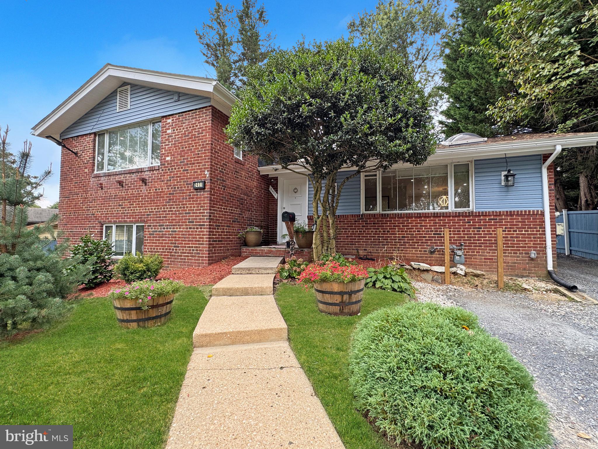 2408 Lillian Drive Silver Spring, MD 20902 - Photo 46 of 54 a front view of a house with garden