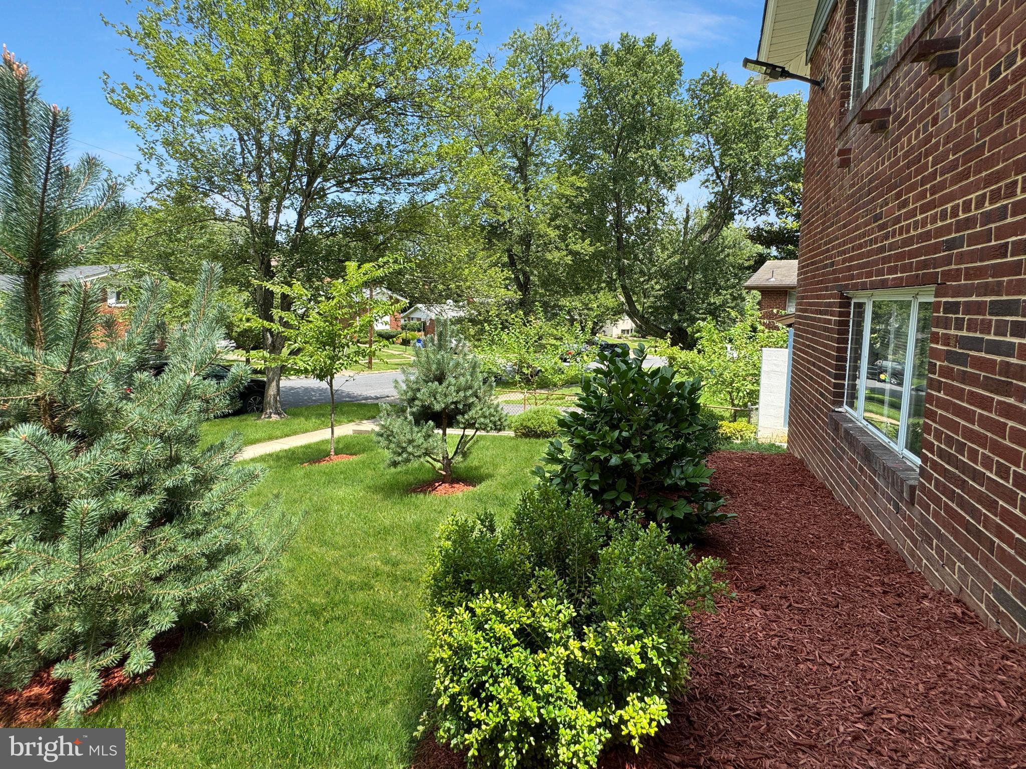 2408 Lillian Drive Silver Spring, MD 20902 - Photo 48 of 54 a backyard of a house with lots of green space