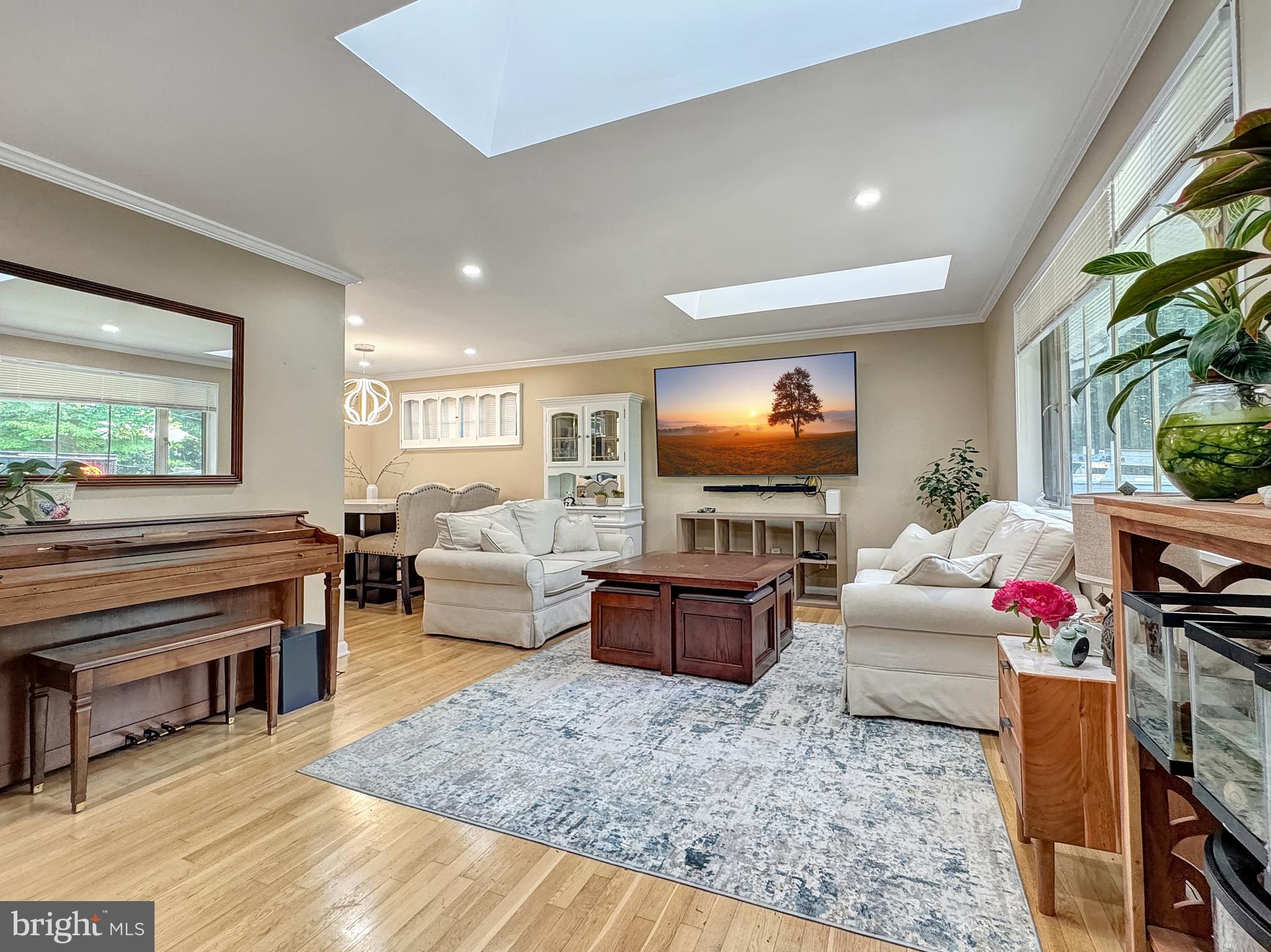 2408 Lillian Drive Silver Spring, MD 20902 - Photo 6 of 54 a living room with furniture and a flat screen tv