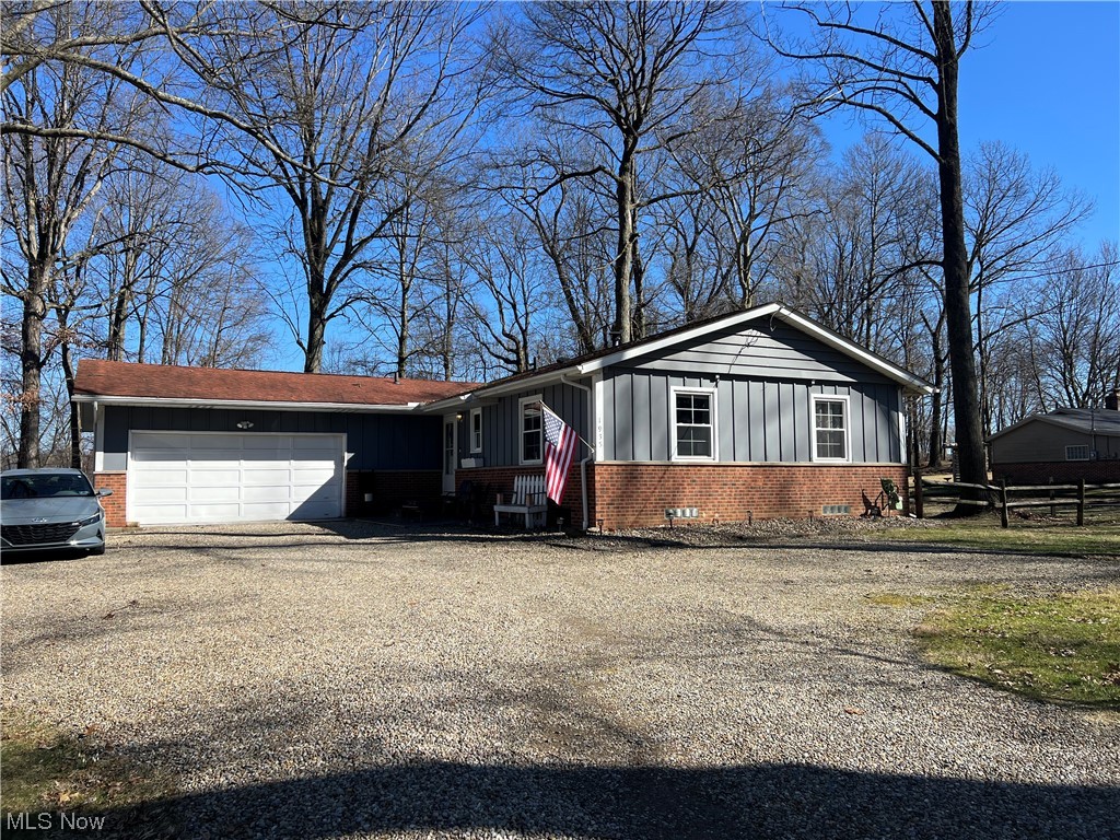 1935 Far View Road Akron, OH 44312 - Photo 1 of 25 Ranch-style home featuring a garage