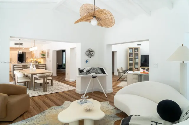 a kitchen with a stove a sink and a microwave