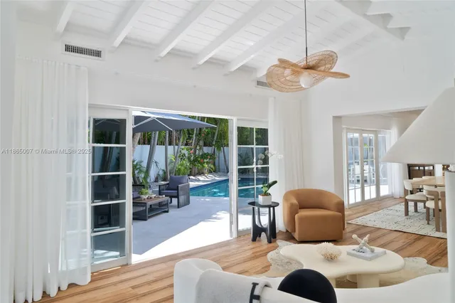 a bedroom with a bed and a mirror