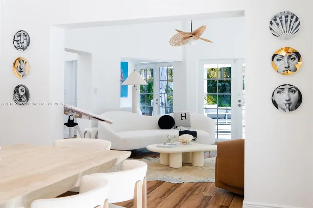 a bathroom with a double vanity sink mirror and shower