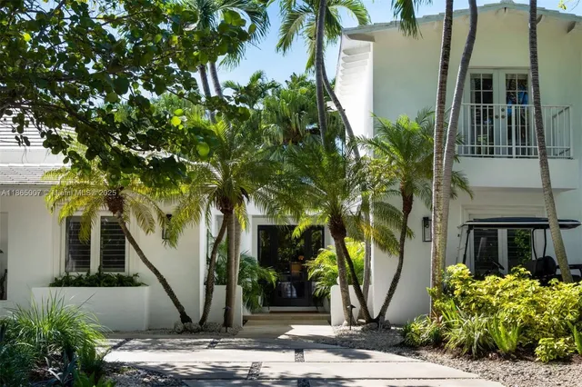 a swimming pool with outdoor seating and yard