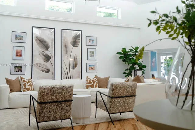 a living room with furniture and a table