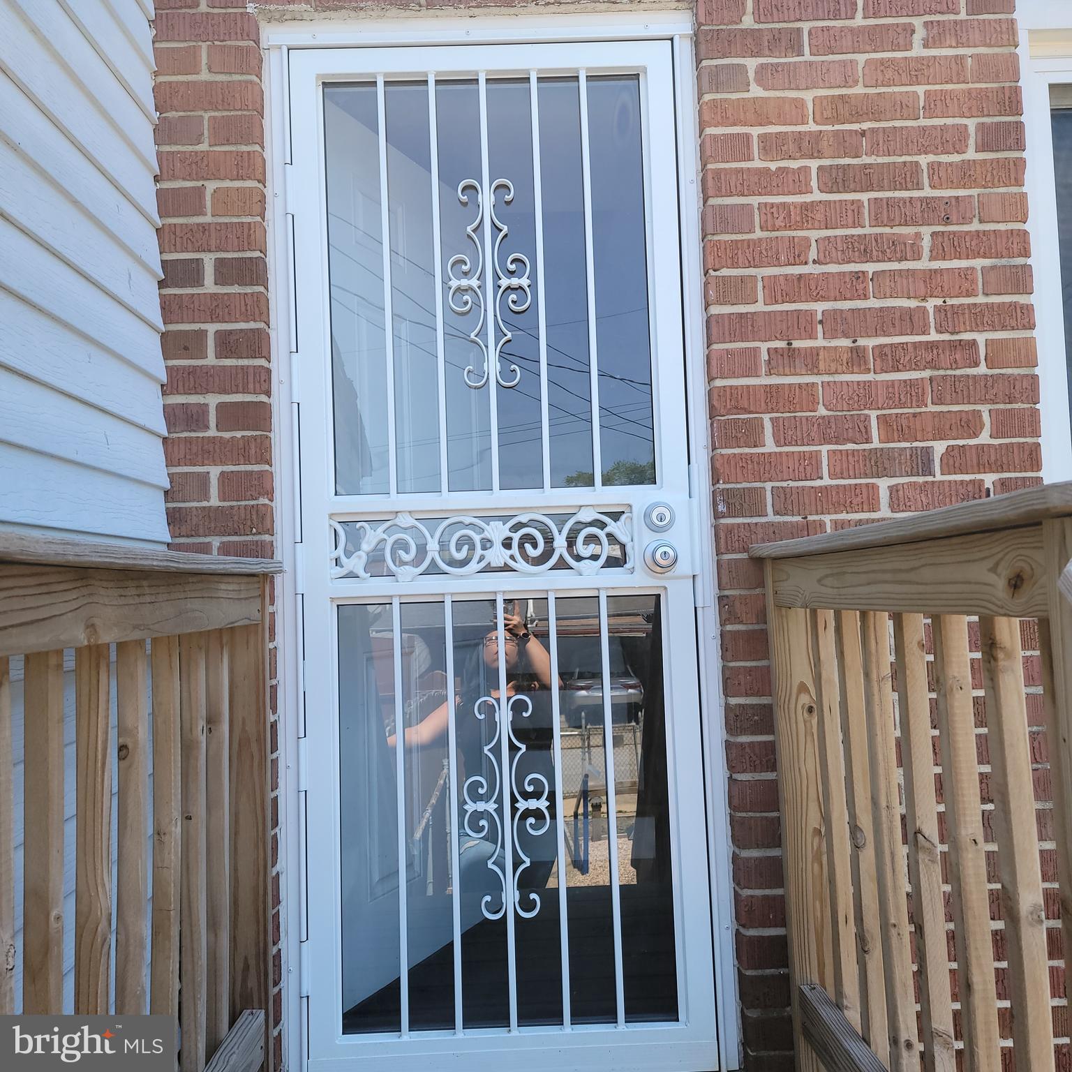 7916 Lansdale Road Baltimore, MD 21224 - Photo 12 of 15 New storm doors on front and back doors.