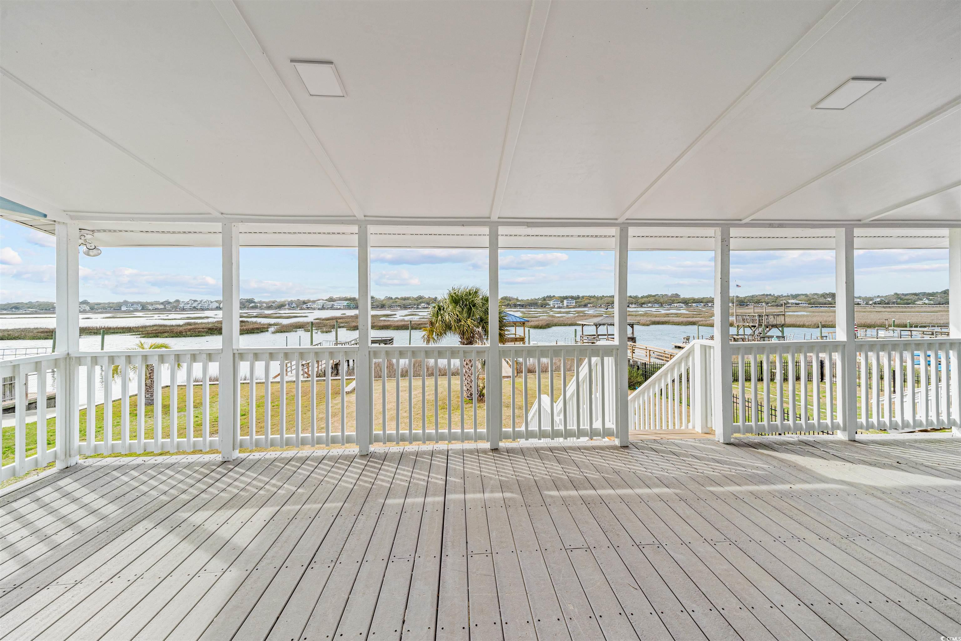 338 State Rd S-26-530 Murrells Inlet, SC 29576 - Photo 20 of 39 Wooden deck with a water view and a yard