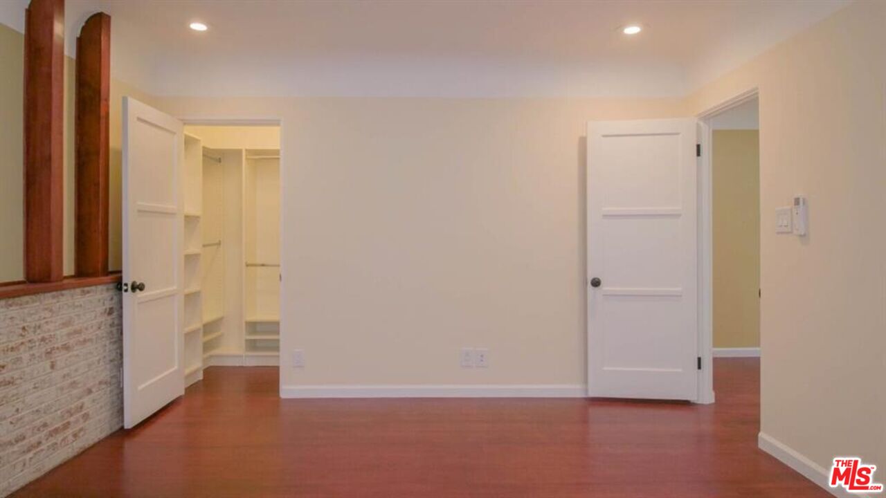 1437 South Ridgeley Drive Los Angeles, CA 90019 - Photo 28 of 37 a view of an empty room