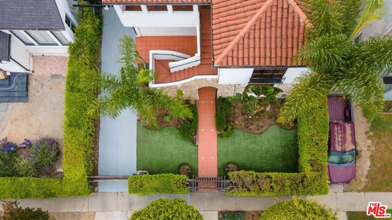 1437 South Ridgeley Drive Los Angeles, CA 90019 - Photo 30 of 37 an aerial view of a house