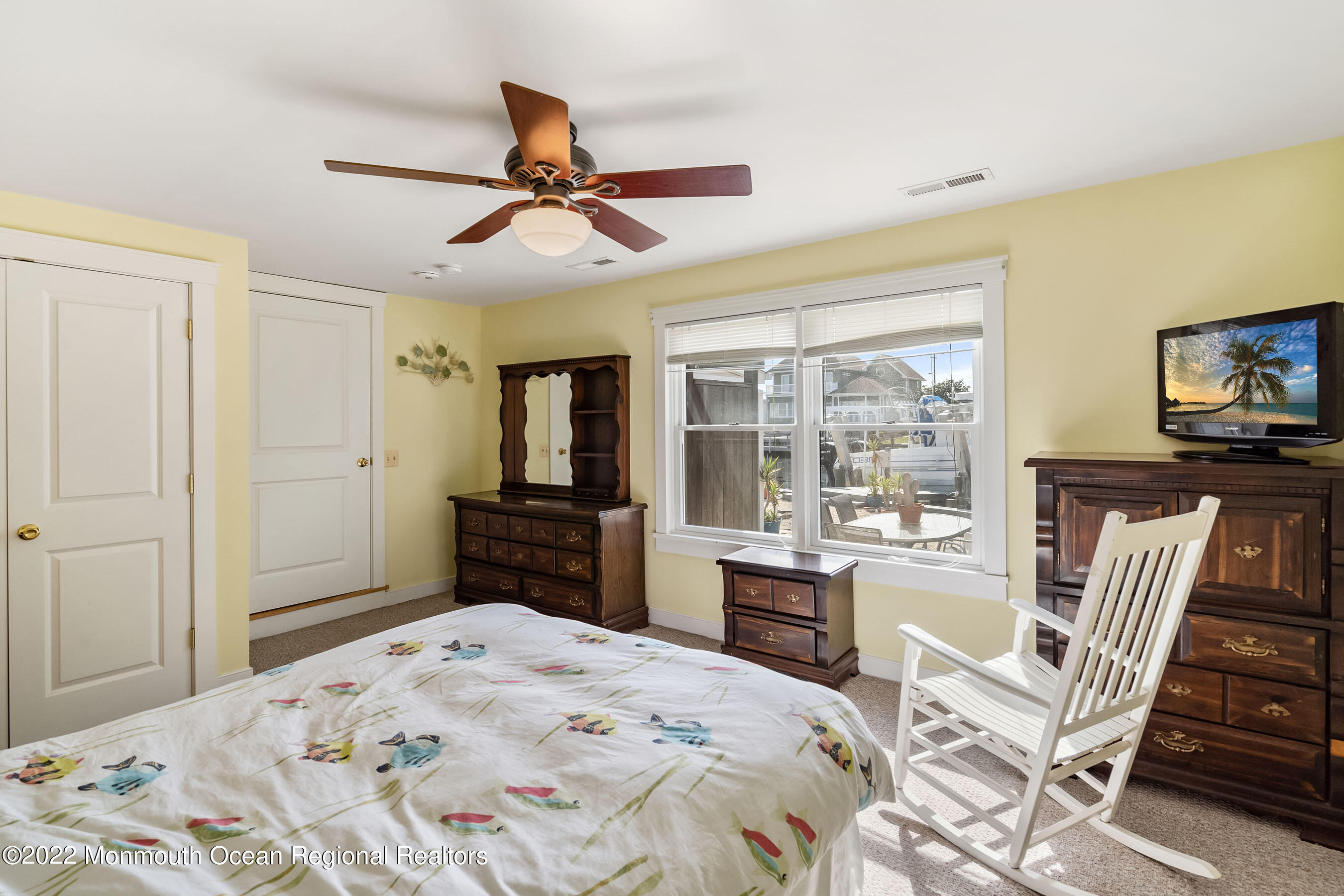 104 Caldwell Road Barnegat, NJ 08005 - Photo 16 of 35 a bedroom with a bed and a television