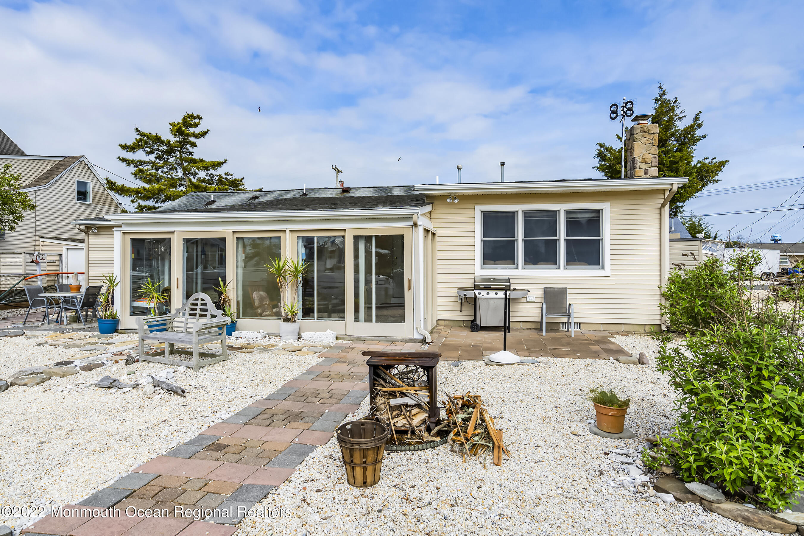 104 Caldwell Road Barnegat, NJ 08005 - Photo 27 of 35 a view of a dinning table and chairs in the patio