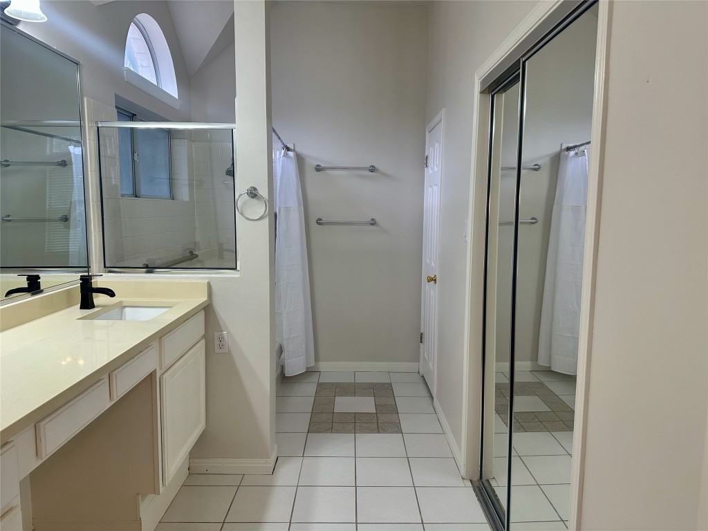 104 Benchmark Street Georgetown, TX 78626 - Photo 19 of 39 a bathroom with a sink and a mirror