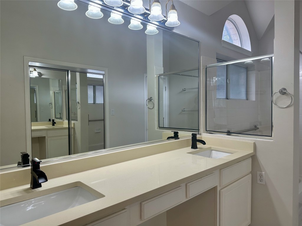 104 Benchmark Street Georgetown, TX 78626 - Photo 20 of 39 a bathroom with a sink a light fixture and a vanity
