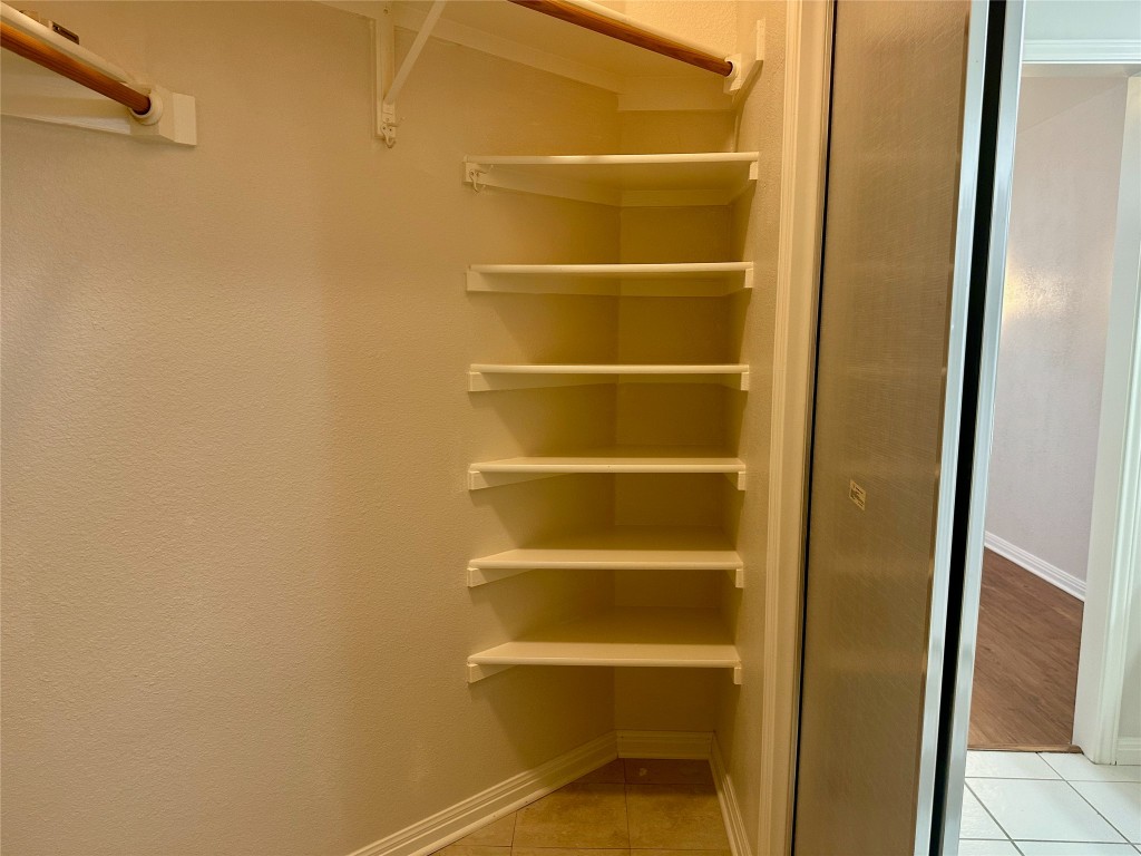 104 Benchmark Street Georgetown, TX 78626 - Photo 21 of 39 a view of a room with empty empty racks