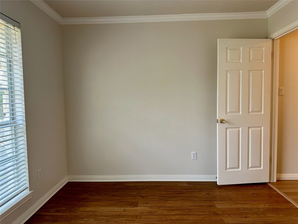 104 Benchmark Street Georgetown, TX 78626 - Photo 23 of 39 a view of empty room with wooden floor and fan
