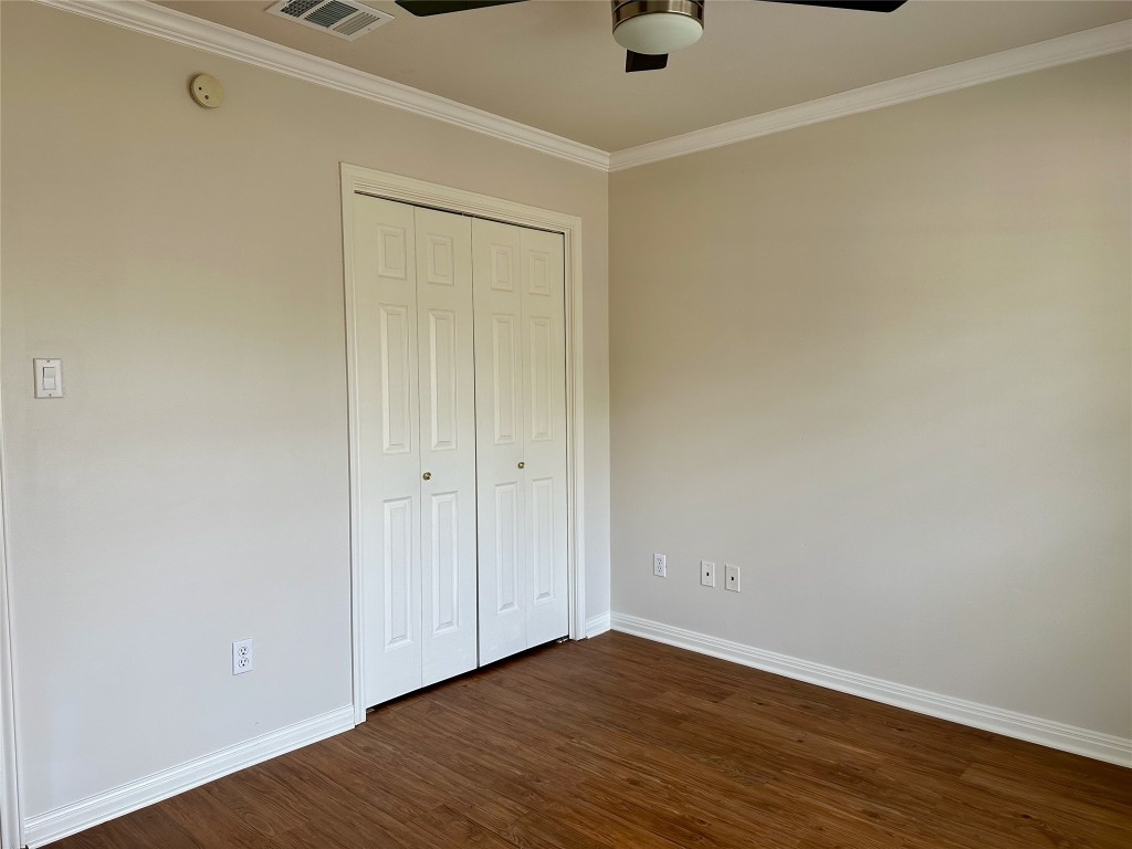 104 Benchmark Street Georgetown, TX 78626 - Photo 24 of 39 a view of an empty room with wooden floor
