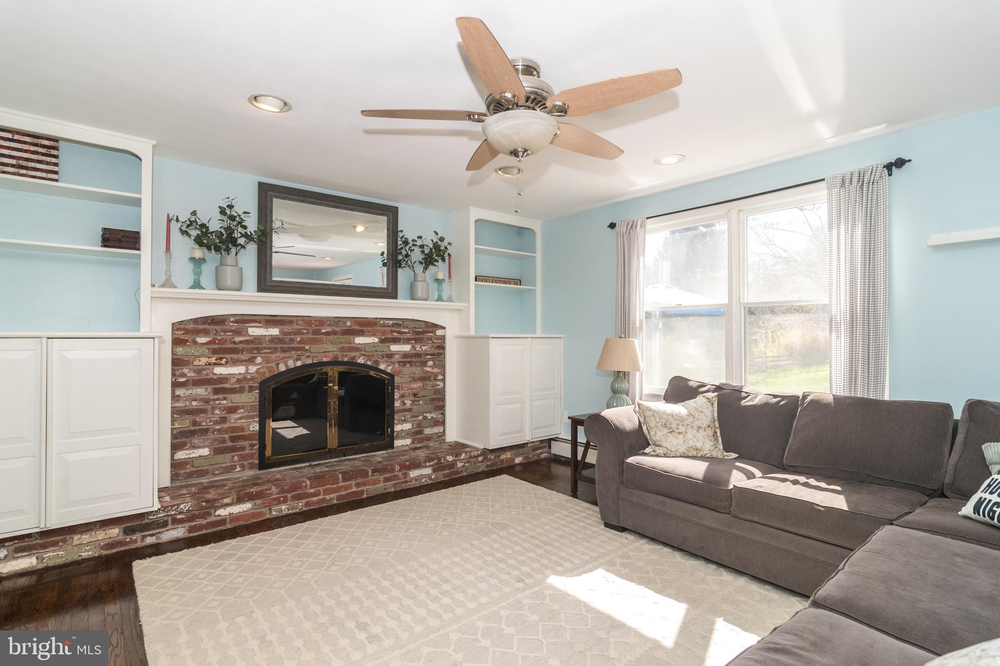 98 Chapman Road Doylestown, PA 18901 - Photo 17 of 49 Charming brick fireplace