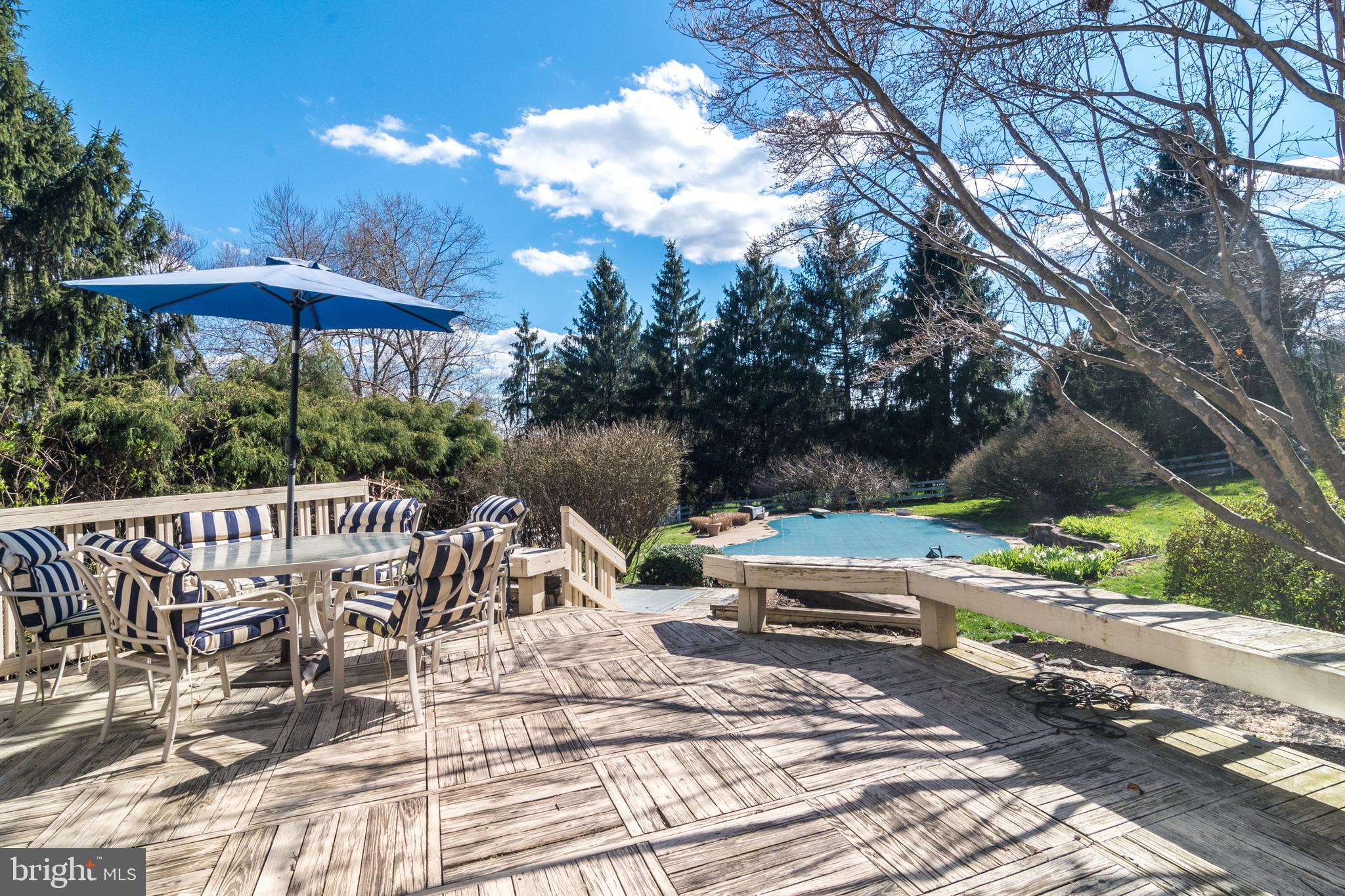 98 Chapman Road Doylestown, PA 18901 - Photo 38 of 49 Deck overlooking pool and yard