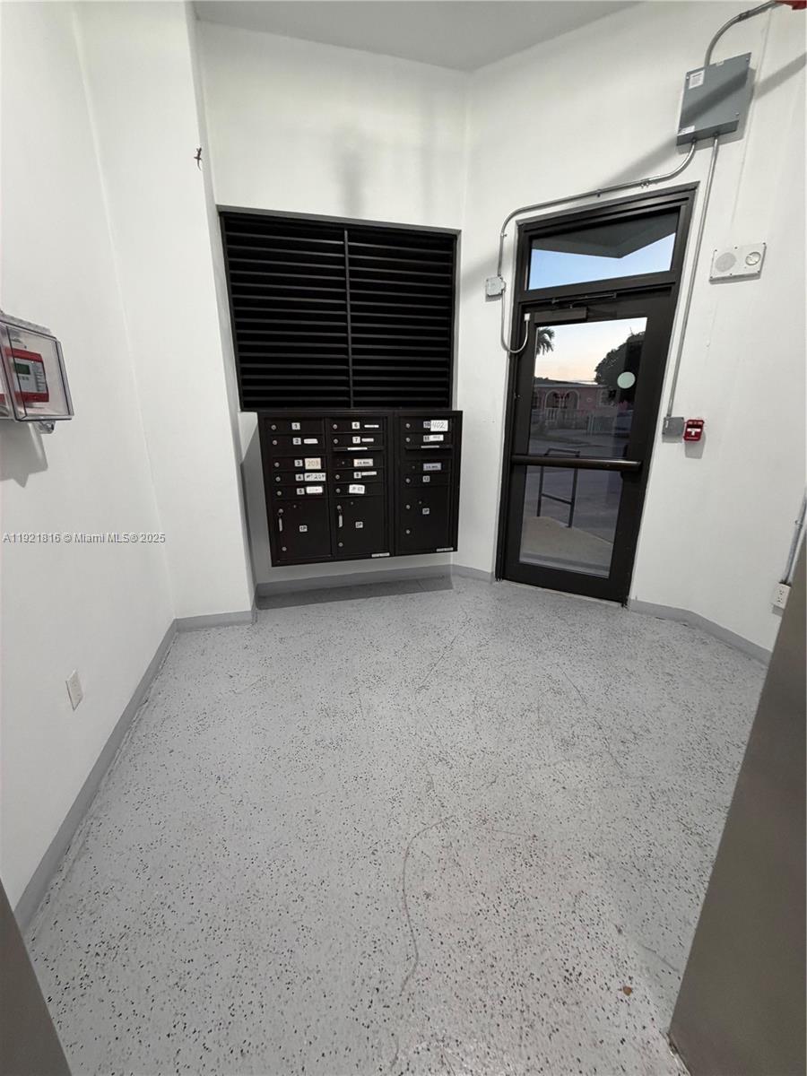 859 East 24th Street, Unit 402 Hialeah, FL 33013 - Photo 16 of 22 a view of an empty room and a window