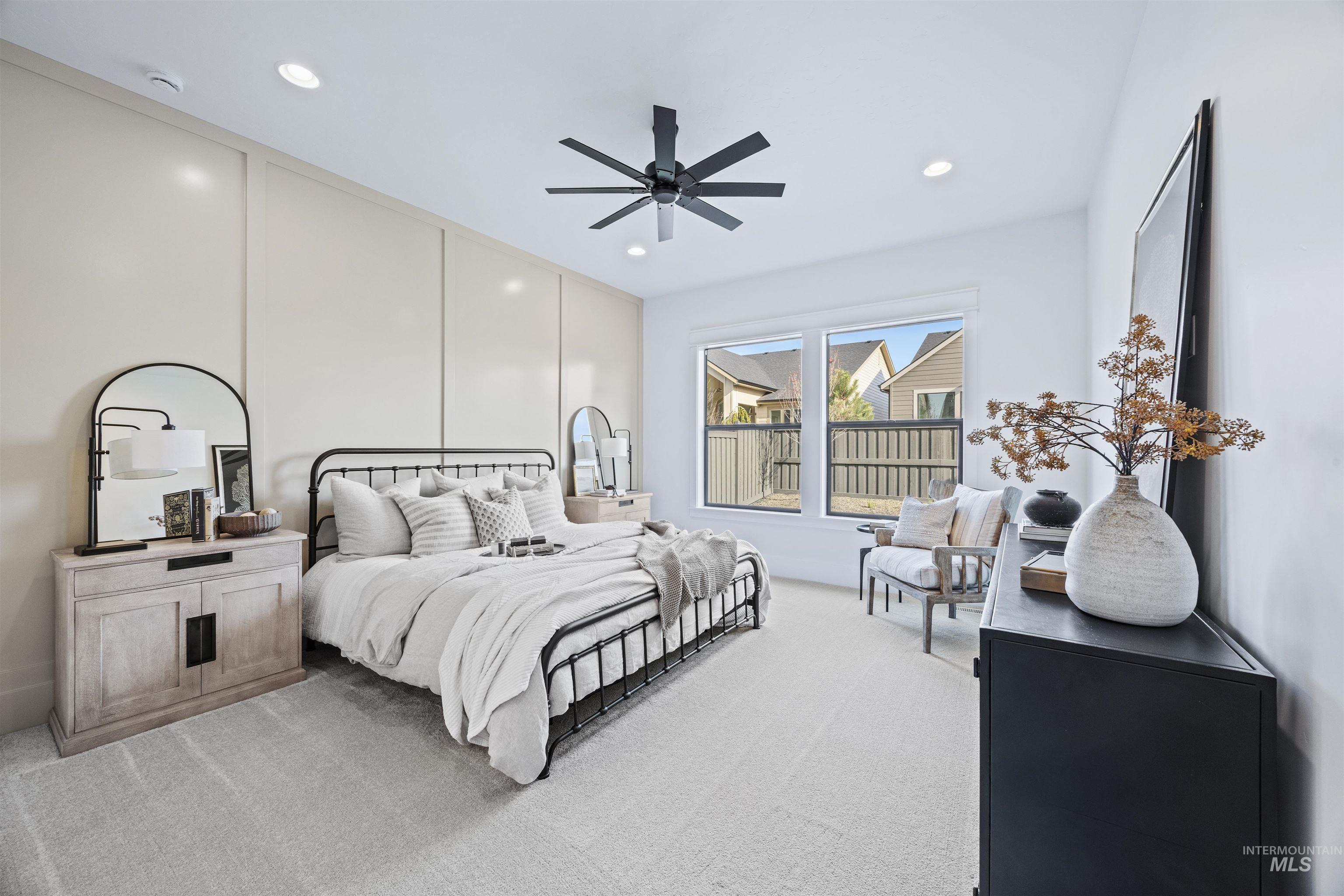 948 East Escalation Street Meridian, ID 83642 - Photo 22 of 44 Bedroom featuring light colored carpet, a ceiling fan, and recessed lighting