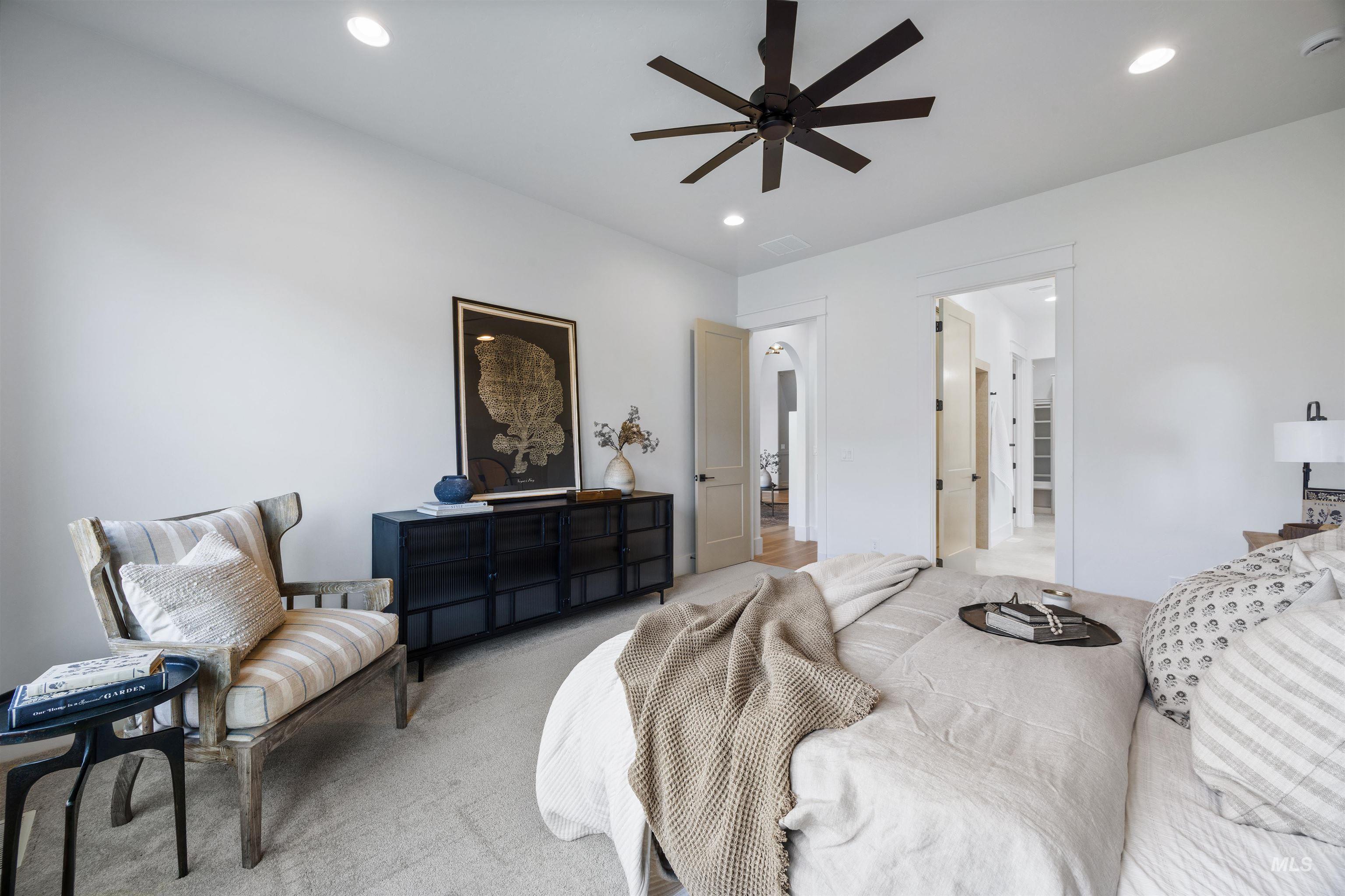 948 East Escalation Street Meridian, ID 83642 - Photo 24 of 44 Bedroom with light colored carpet, a ceiling fan, and recessed lighting