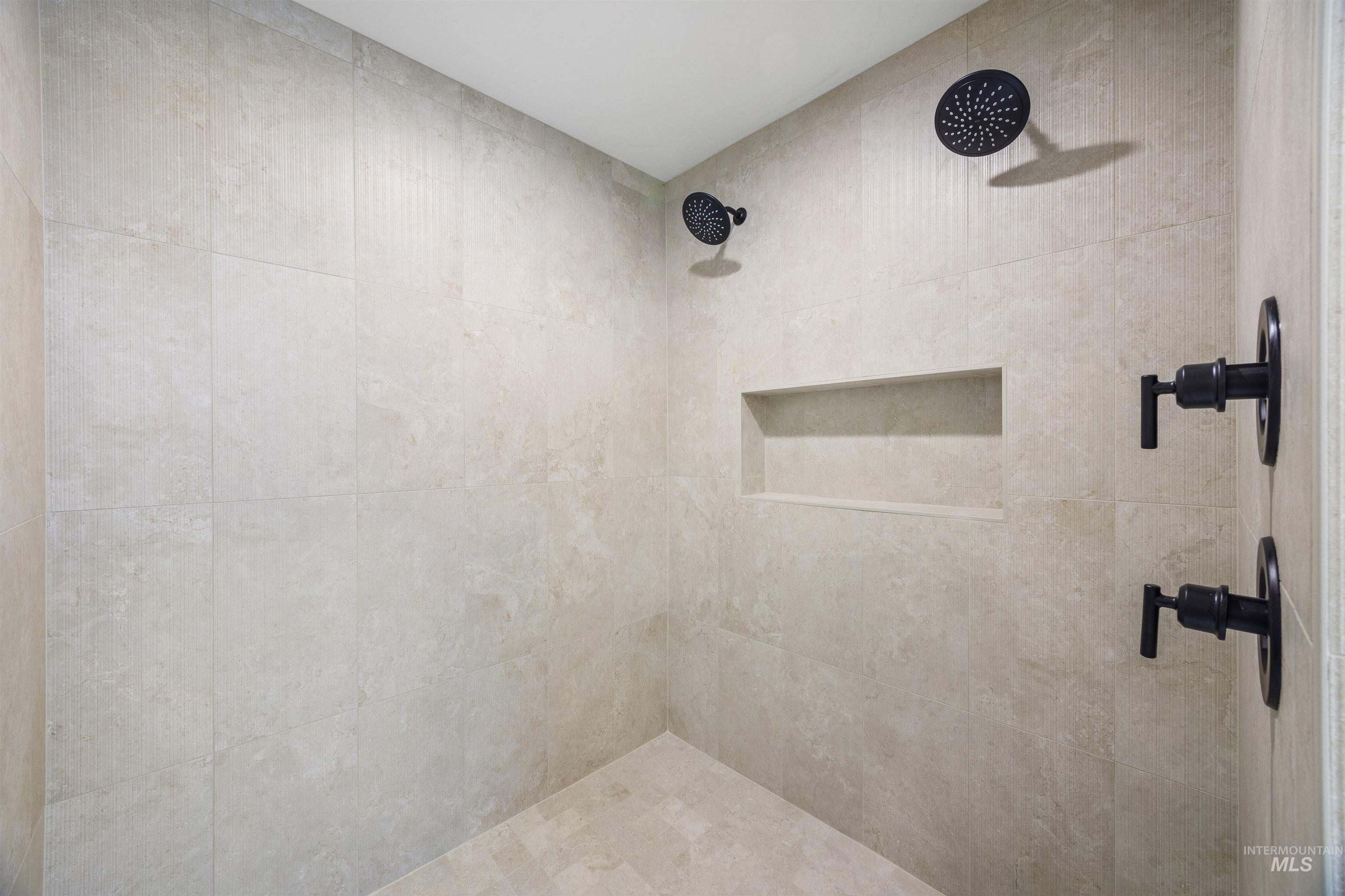 948 East Escalation Street Meridian, ID 83642 - Photo 27 of 44 Full bathroom with a tile shower